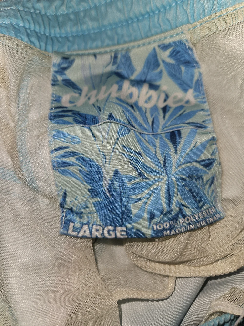chubbies Light Blue Swim Trunks with Pink and Yellow Graphic